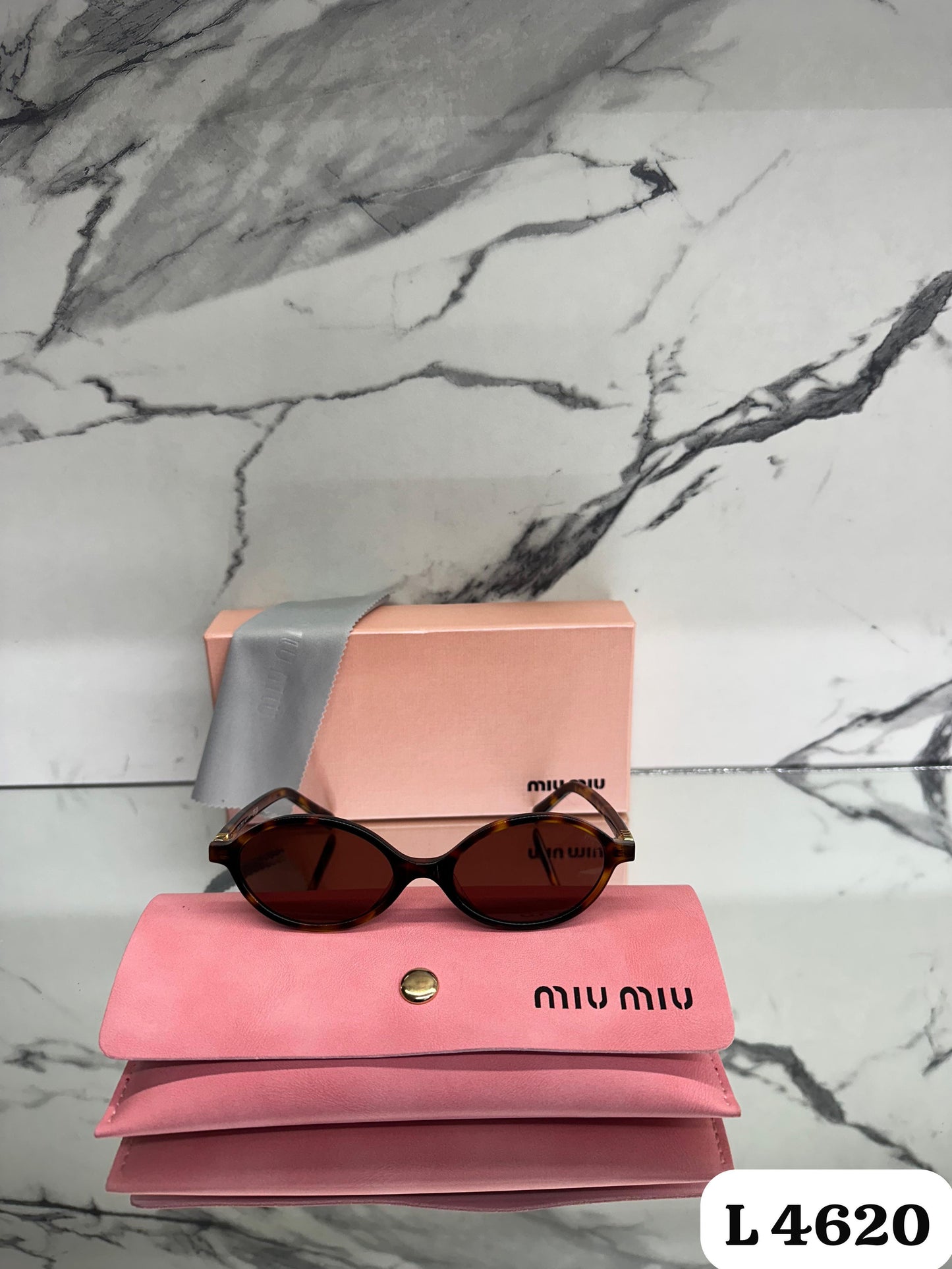 Lente Miu Miu