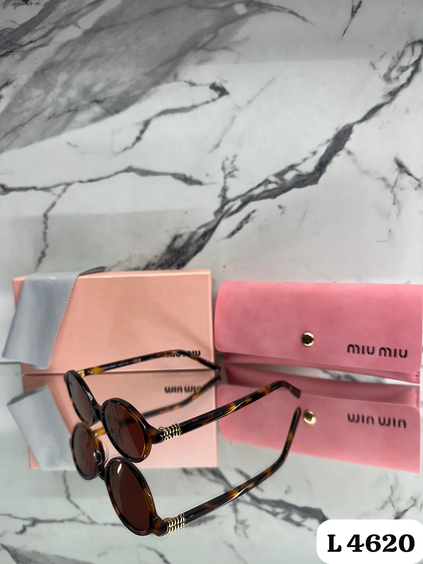 Lente Miu Miu