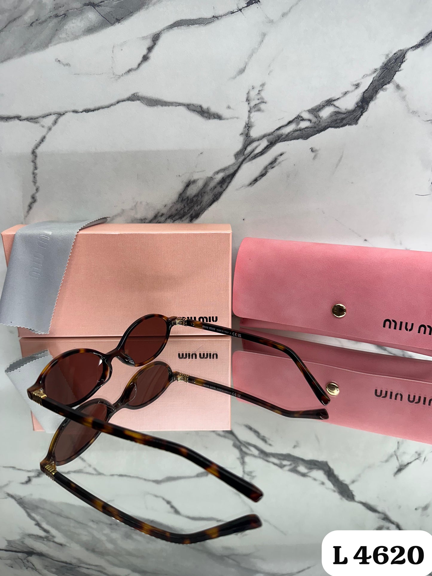 Lente Miu Miu